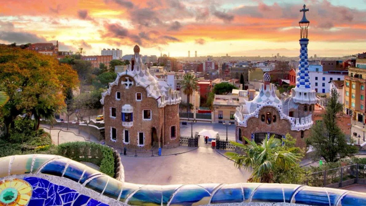 Park Güell and the Barcelona skyline at sunset